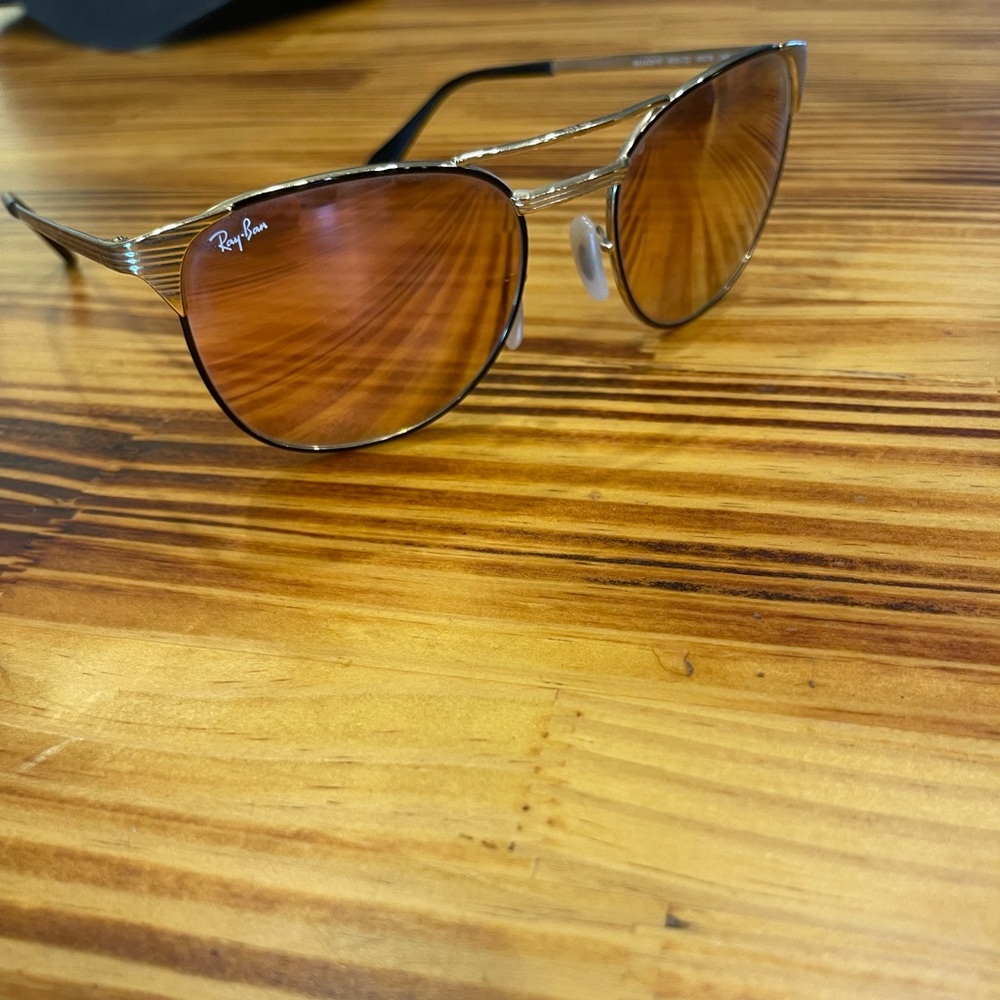 Ray ban rose gold Signet glasses.